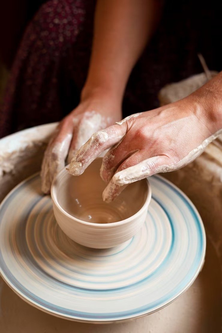 harline imgi_25_person-modeling-clay-potter-s-wheel_23-2148679110
